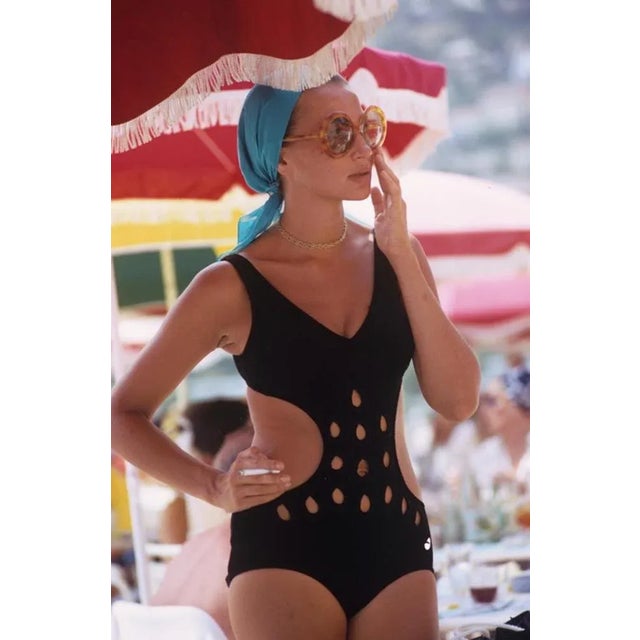 Monte Carlo Swimwear 1970 by Slim Aarons Slim Aarons Limited Estate Edition A woman in a cutaway swimsuit in Monte Carlo,...