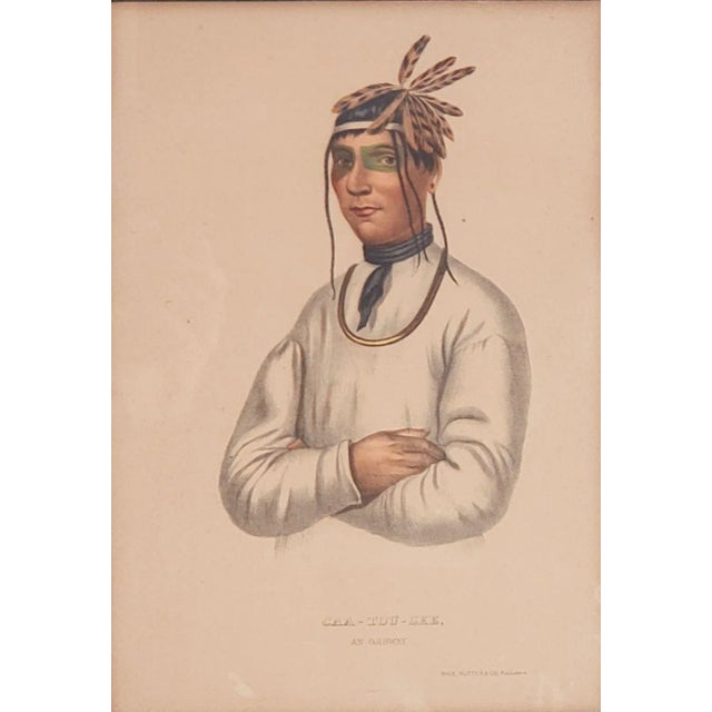A hand-colored engraving of American Indians, 19th century.