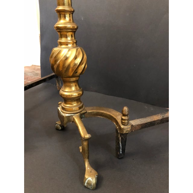This pair of antique Victorian brass andirons in High Quality Materials and craftsmanship. Solid brass unique spiral flame...