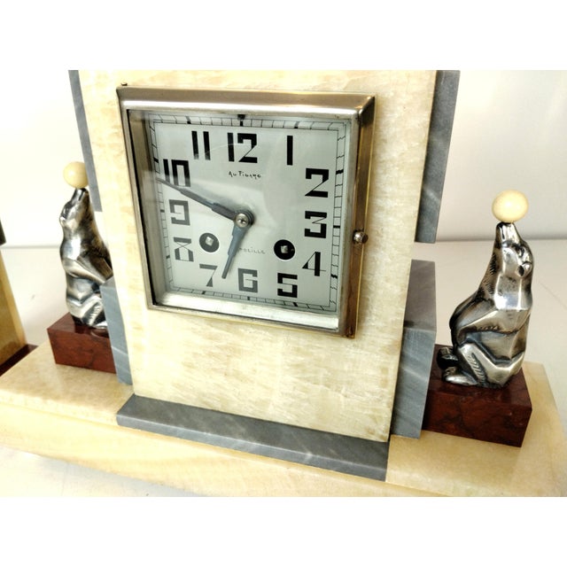 Rare antique french clock set. This authentic 1930s art deco mantel clock set is crafted from genuine onyx and geometric...