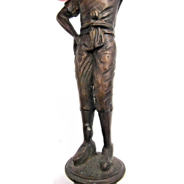 Matched Pair of Vintage Boho Patinated Bronze Boy Torchbearer Candle Holders For Sale In Miami - Image 6 of 9