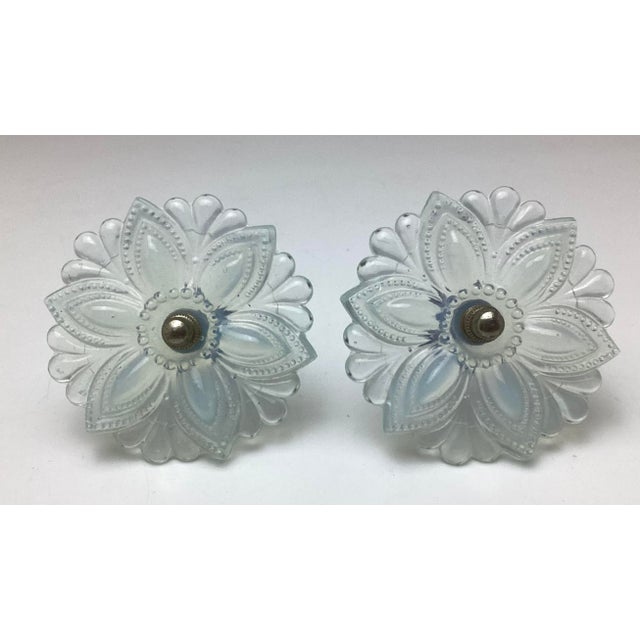 19th Century Boston & Sandwich White Blue Opalescent Glass Flower Drapery Tiebacks Pair. 3 1/2 inches in diameter by 4 1/4...