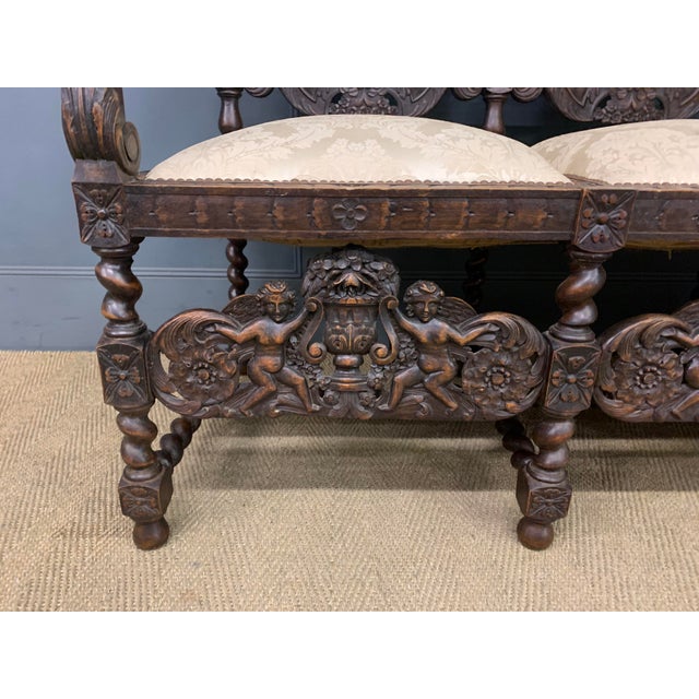 A bold and impressive late 19th century Carolean style high-back settee of generous proportions. Very well constructed in...
