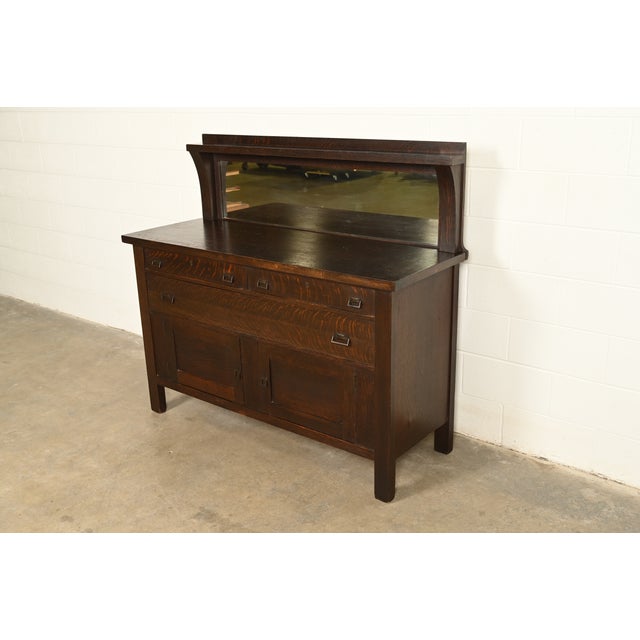 An exceptional antique Mission or Arts & Crafts sideboard, credenza, or bar cabinet In the manner of Stickley Brothers...