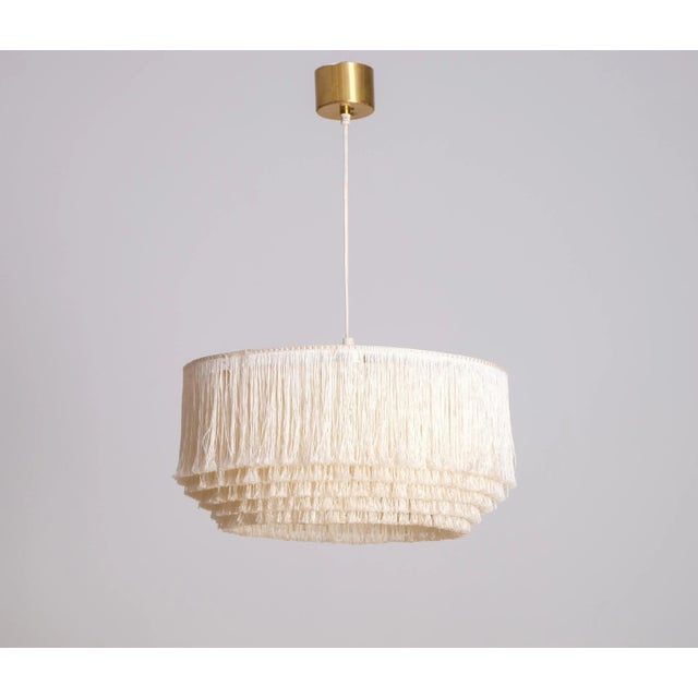 Hans-Agne Jakobsson White/Ivory Fringe Pendant, 1960s. Produced in Sweden by Hans-Agne Jakobsson AB in Markaryd, 1960s....