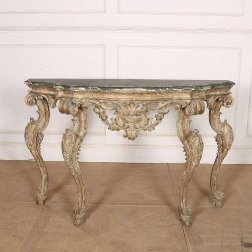 Wonderful 18th century Italian carved pine console table with original paint. 1780. This piece is designed in the style of...