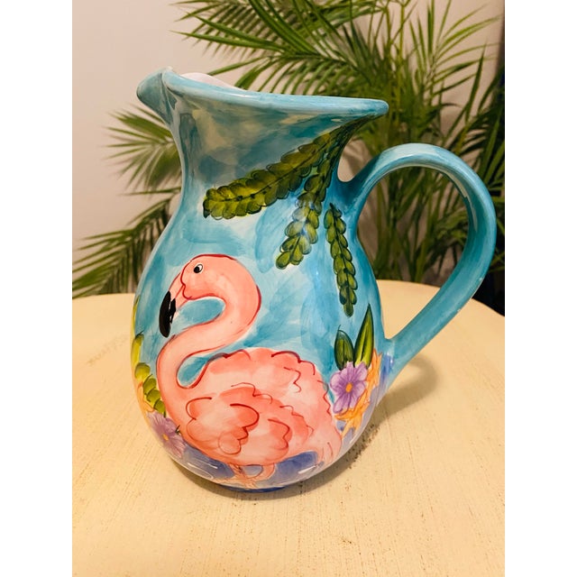 The perfect ceramic pitcher for your summer table, bright colors lots of flowers and a beautiful flamingo.