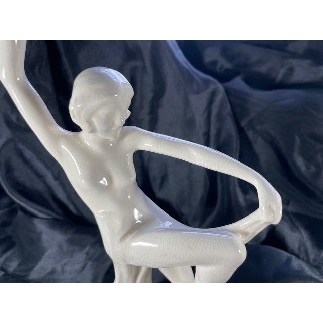 Stunning vintage white ceramic Figural flower frog centerpiece by Cowan. It was made about 1927. It is stamped on the...
