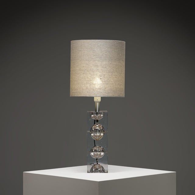 This sculptural Space Age table lamp of the late 1960s to 1970s is a striking example of European modernist lighting...