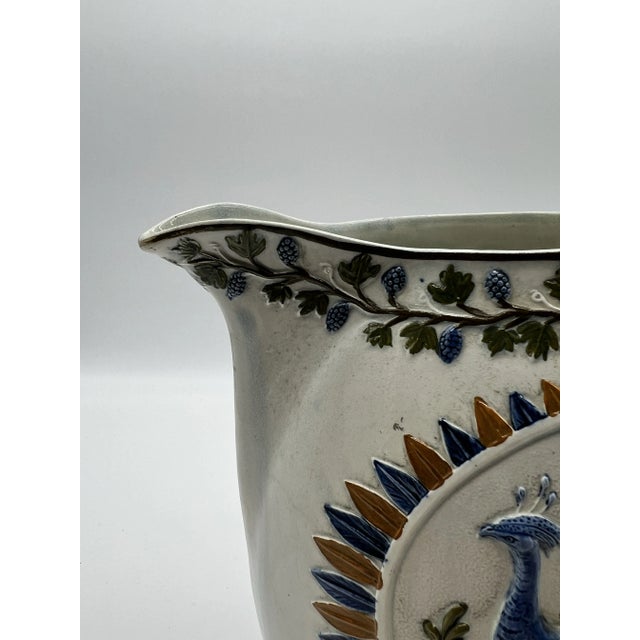 A Antique Prattware Polychrome Decorated Pearlware Pitcher With Peafowl, Circa 1820's Made by the F &R Pratt Co. in...