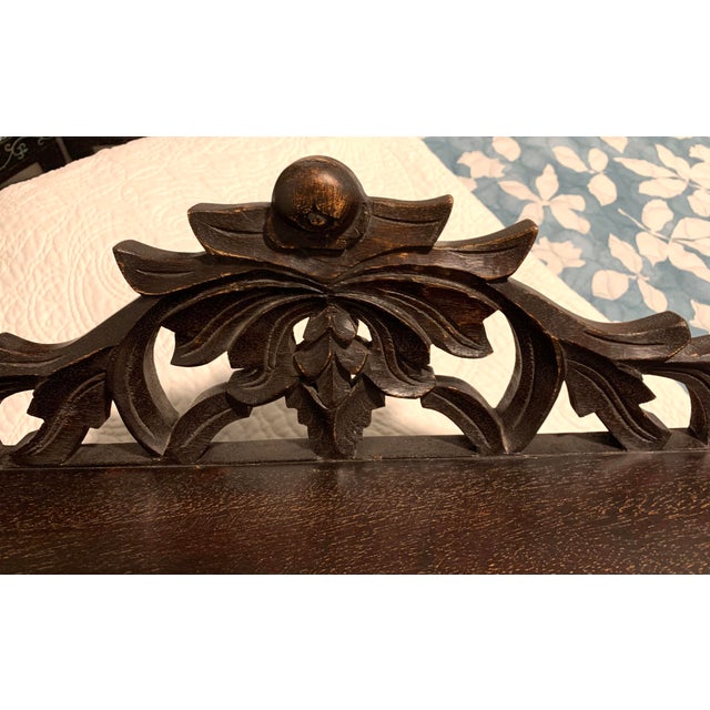 Elaborately carved wood shelf with metal hooks perfect for an entryway. Ready for hanging.