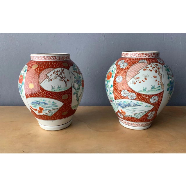 A near pair Hizen pottery jars from Artia Japan, circa mid-19th century of the Meiji Era. Heavy stoneware construction...