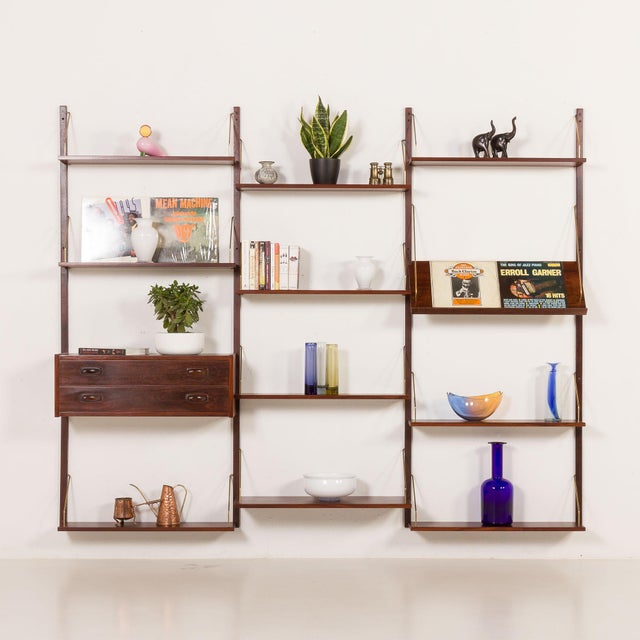Danish rosewood modular wall shelving system, preben sørensen for ps system, randers, 1970s this danish rosewood wall...