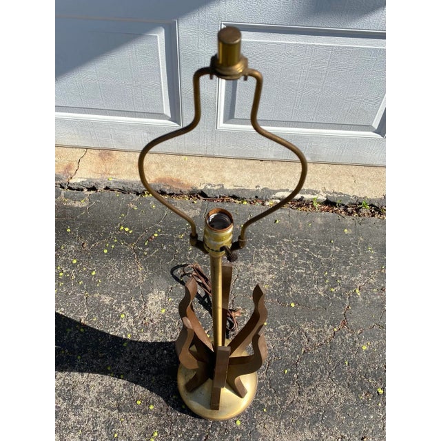 A lovely Vintage mid century sculptural lamp. The upward reaching tendrils are made of solid walnut, and each one is...