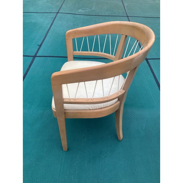 Bottom of chair has written note that says the seat was replaced with white leatherette in February of 1960. Could be...