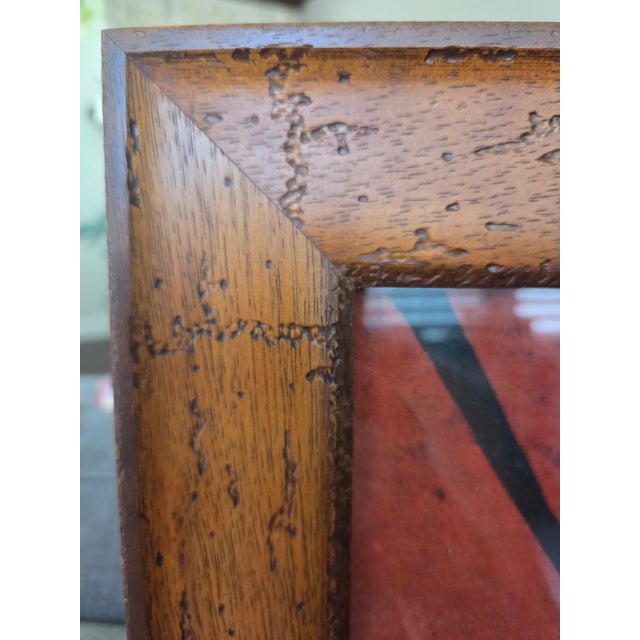 Bring the spirit of Africa into your home with this captivating large batik artwork. Hand-dyed on fabric and set within a...