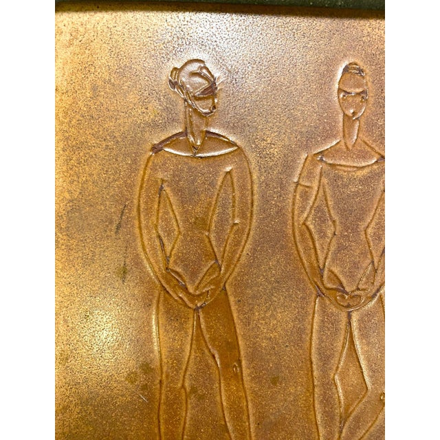 This framed ceramic tile by Adele Chase captures four ballet dancers in a series of graceful, understated poses. The...