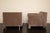 A sophisticated pair of silk-upholstered armchairs by India Mahdavi, designed exclusively for Ralph Pucci International....