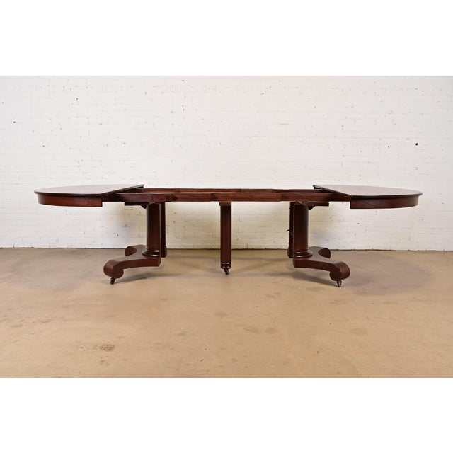 Late 19th Century R. J. Horner Style Antique American Empire Monumental Carved Mahogany Pedestal Extension Dining Table, Newly Refinished For Sale In South Bend - Image 6 of 13