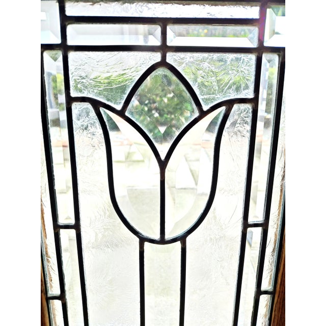 Vintage original leaded stained glass panel. It has 2 hooks to hang outdoor or indoor.