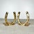 Vintage mid century pair of brass horseshoe bookends. Perfect equestrian accent for your book shelf.