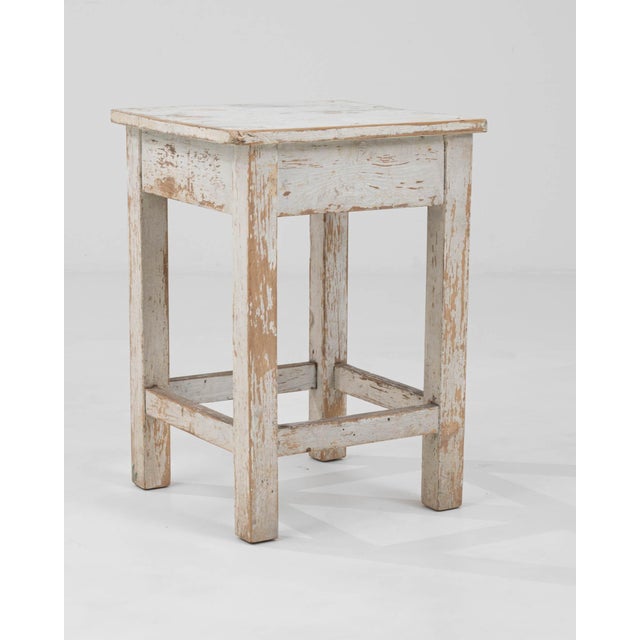 Embrace rustic charm with this Early 20th Century Central European Wood Patinated Stool. Its character-filled patina tells...