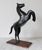 Folk Art Folk Art Cast Metal Painted Black Rearing Horse on Wood Base For Sale - Image 3 of 10