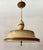 This cool vintage chandelier features a dramatic saucer-form silhouette crafted in painted tole metal with warm almond...
