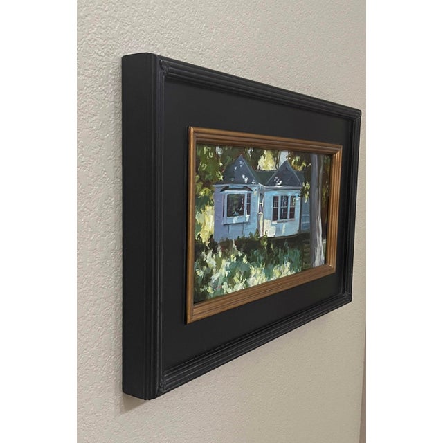 Rustic Cottage Life by Sheri Farabaugh | Oil on Hardboard Painting of a blue cottage surrounded by greenery For Sale - Image 3 of 3