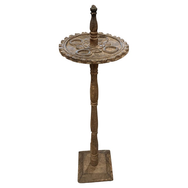 Beautiful hand carved antique candle holder. This can also be used as a place holder for keys. Full dimensions; Base 8 x 8...