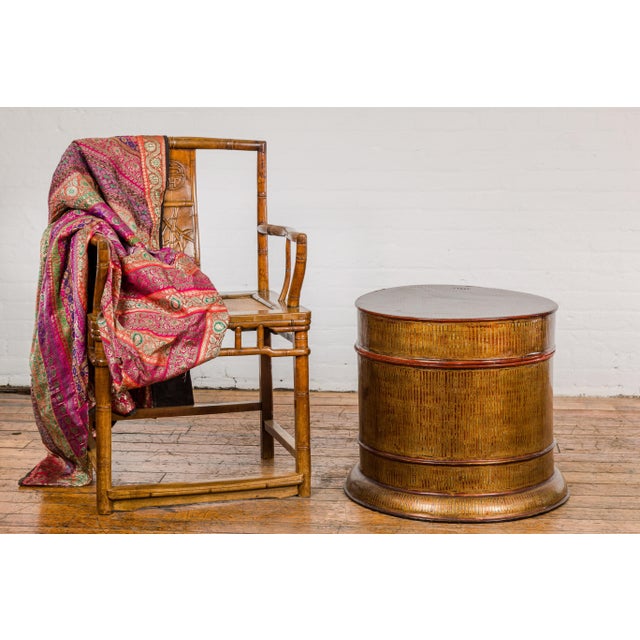 A vintage negora lacquer circular storage bin box from the mid-20th century, with vertical stripes and lid. This mid-20th...