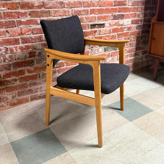 Vintage mid-century Danish modern armchair designed by Erik Kirkegaard for Høng Stolefabrik, Denmark. This Scandinavian...