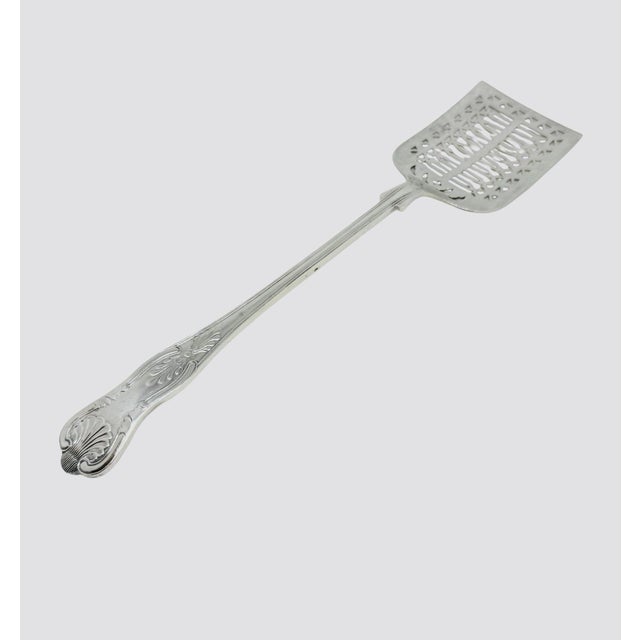 Elegant vintage English silver‑plate (EPNS) slotted spatula — flat square head with decorative cutouts and a richly...