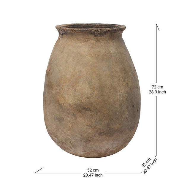 Ancient Berber Clay Jar Bring a piece of Moroccan heritage into your home with this antique clay jar, crafted over nine...