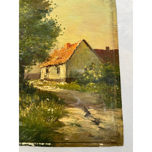 Vintage European oil painting. Rural cottage near a tree lined river bank. Peaceful setting created in the impressionist...