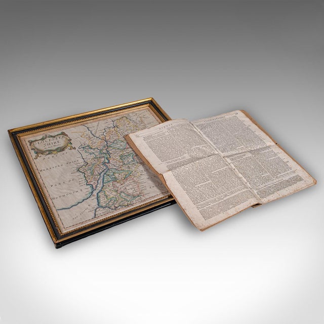 This is an antique county map of Gloucestershire with atlas folio. An English, framed engraving of cartographic interest...