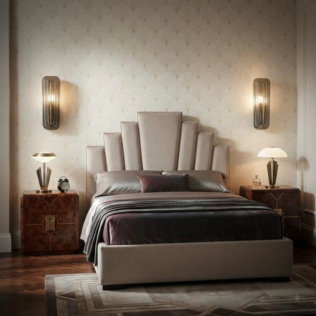 Very original Murano glass wall lamp with a very elongated design of the glass plate and a unique smoky color. The...