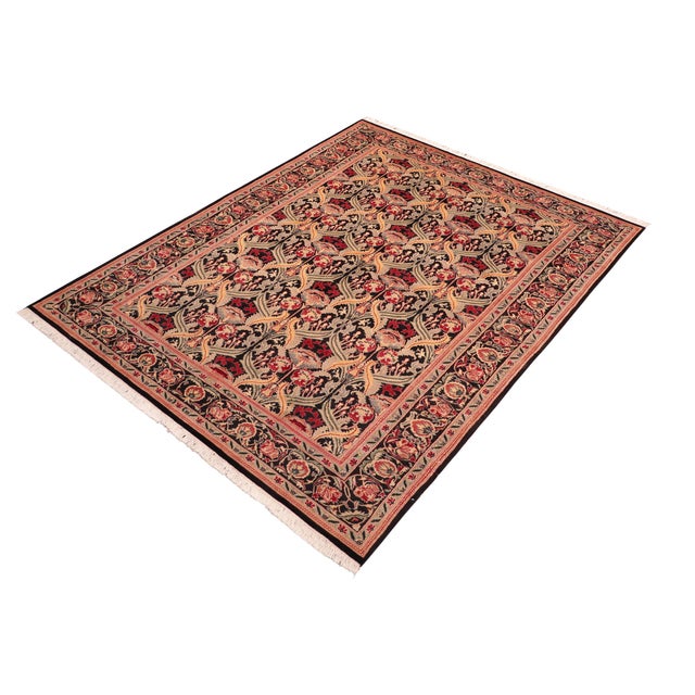 Designed with mesmerizing intricacy and gorgeous color palette, this hand-knotted masterpiece demonstrates the beauty and...