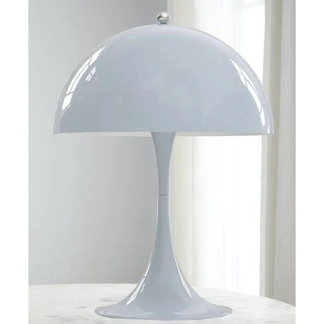 Brand new in original box, this authentic Louis Poulsen Panthella 250 Mini Table Lamp is a highly collectible Danish...