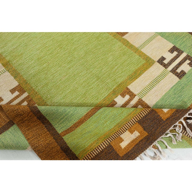 Vintage Green Flat-weave Rug by Ingegerd Silow Size: 6'3" × 9'3" (190 × 281 cm) A vintage, Swedish flat weave wool rug...