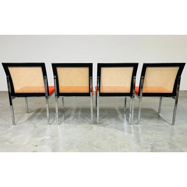 A beautiful and rare set of 4 Paul McCobb for Lane cane back dining chairs having a combination of ebonized mahogany and...