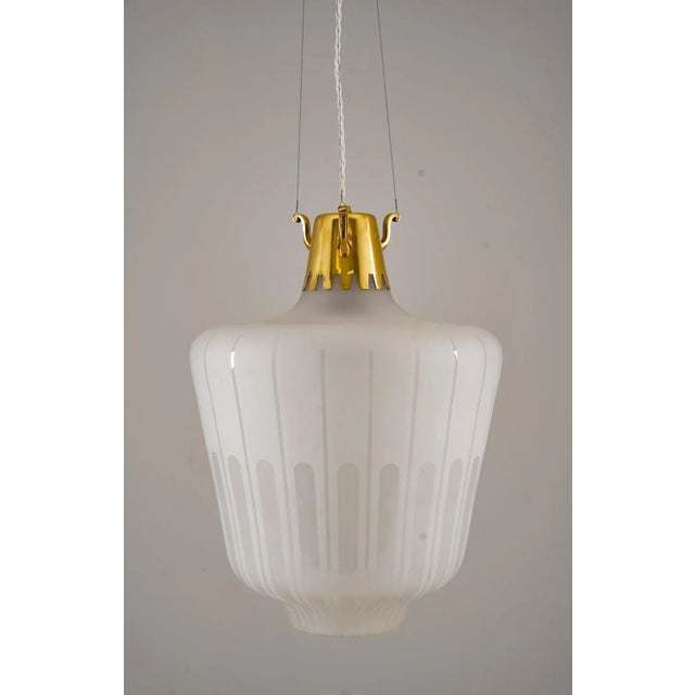 Large set of model 1588 by Bröderna Malmströms, Sweden This model features a large blasted glass shade with blank...