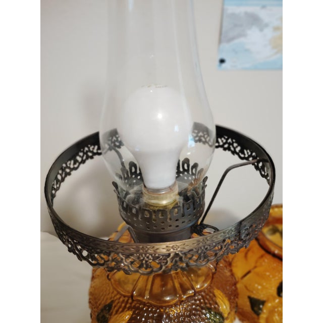 1970s Pair of Vintage 1970 Ef & Ef Industries Hurricane Lamp Model 338 Amber Glass Yellow Rose For Sale - Image 5 of 9