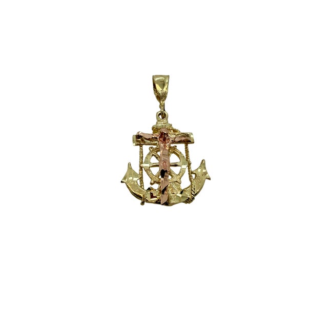Fine 14K yellow and rose gold religious pendant featuring an anchor form with a raised Christ on the cross. Tested and...