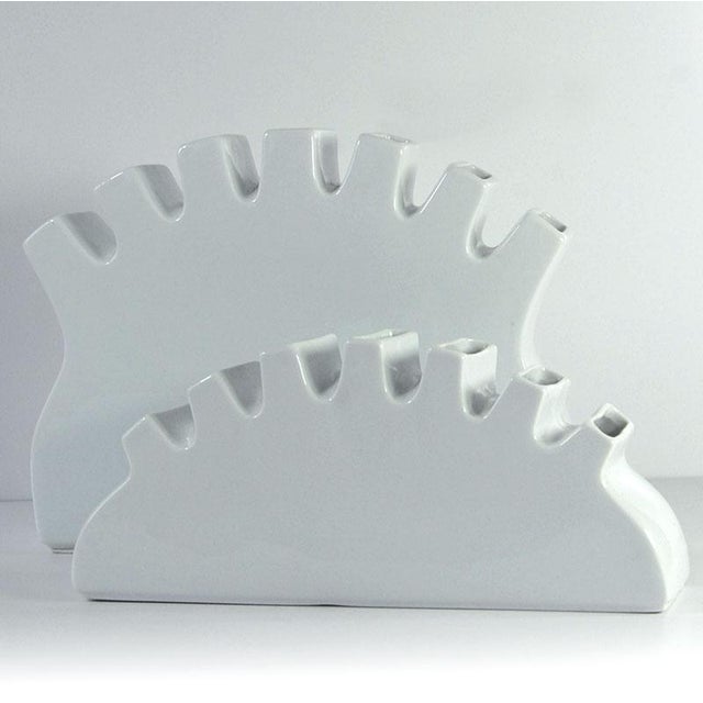 A pair of unique, postmodern vases made of white-glazed ceramic. Made in Belgium in the 1990s, they are signed and in very...