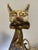 Whimsical vintage seated cat sculpture attributed to Jeanne Valentine, handcrafted from papier-mâché and finished in...