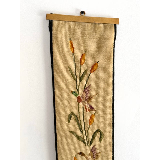 Exceptional needlepoint embroidery bell pull with mallard duck and cattail motif. Backed with velvet and finished with...