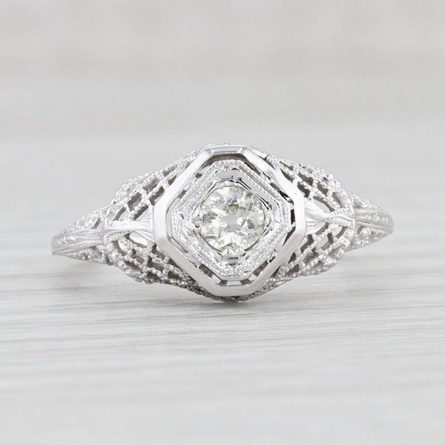 This beautiful ring is done in an antique filigree style though it is not an actual antique piece. Gemstone Information: -...