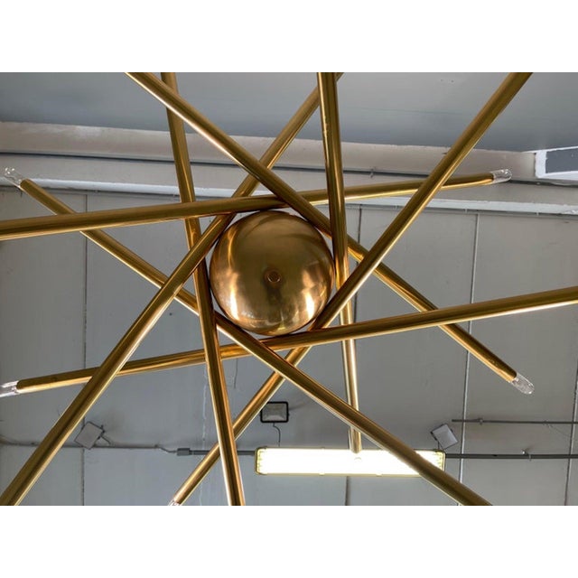 Large Shanghai Brass Chandelier Attributed to Stilnovo Up to 250V (Europe/UK Standard).The wiring of this item may be...