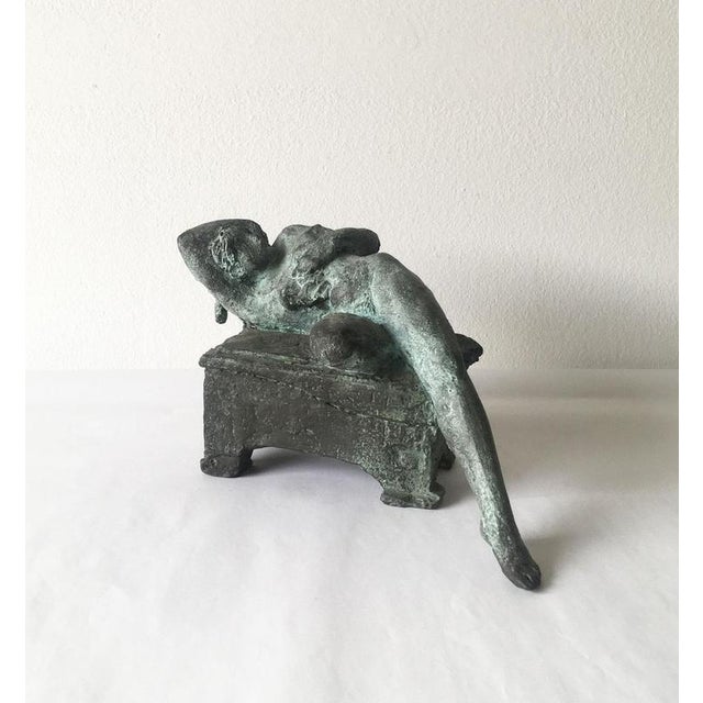 This is an intense bronze sculpture created by the Italian artist Ugo Riva, in 2006. Lost wax bronze. The title of this...